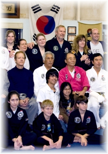 Ann Moser, Robyn Fleming and Robert Fleming (back row) in a group portrait